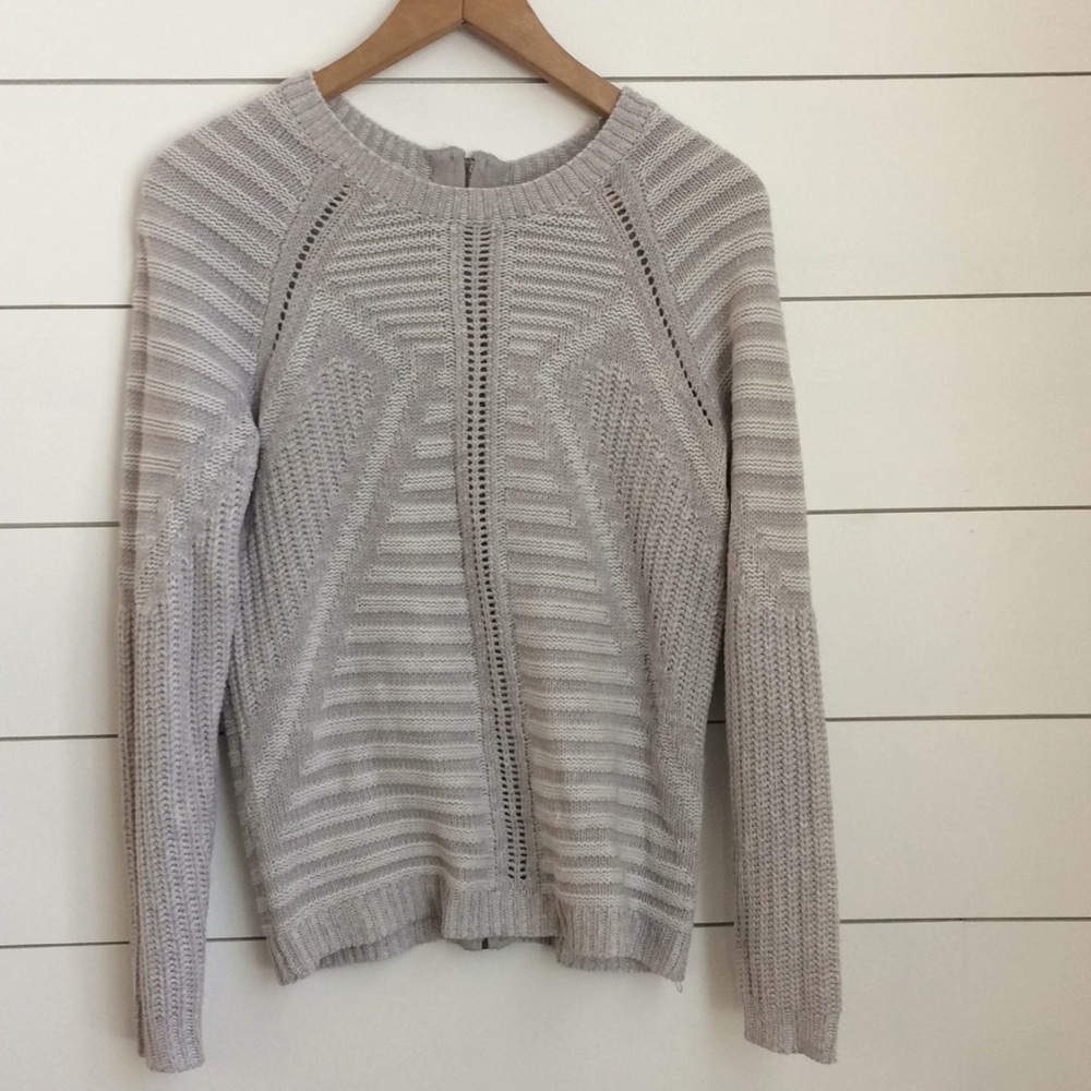 The limited grey and white sweater with zipper